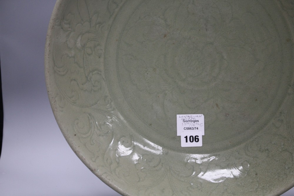 A 15th / 16th century Longquan celadon dish, incised with flowers, diameter 43cm, height 8.5cm